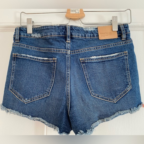 Zara cut off denim shorts with red stripe down the side. - Picture 2 of 3